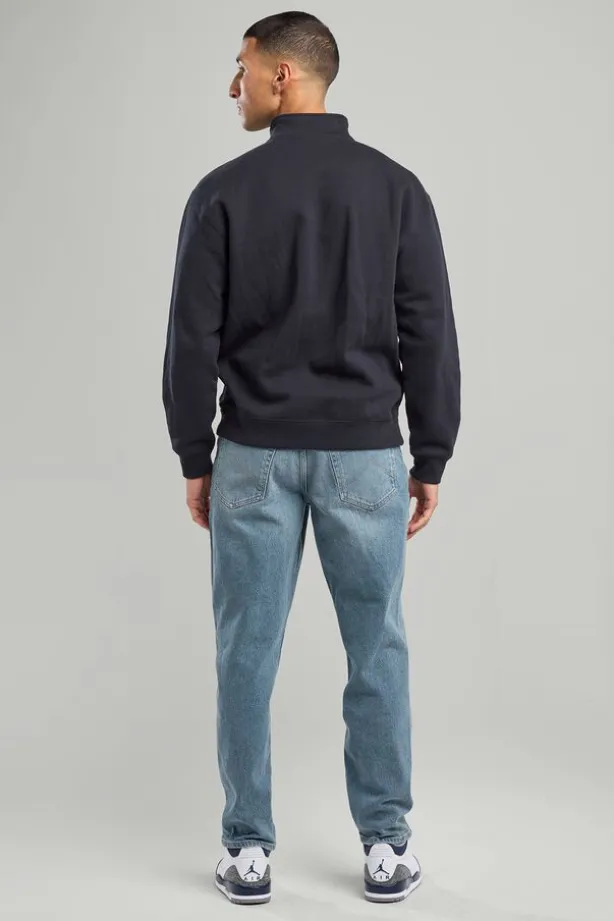 Jeans Delta Five-pocket jeans met een relaxed tapered fit
