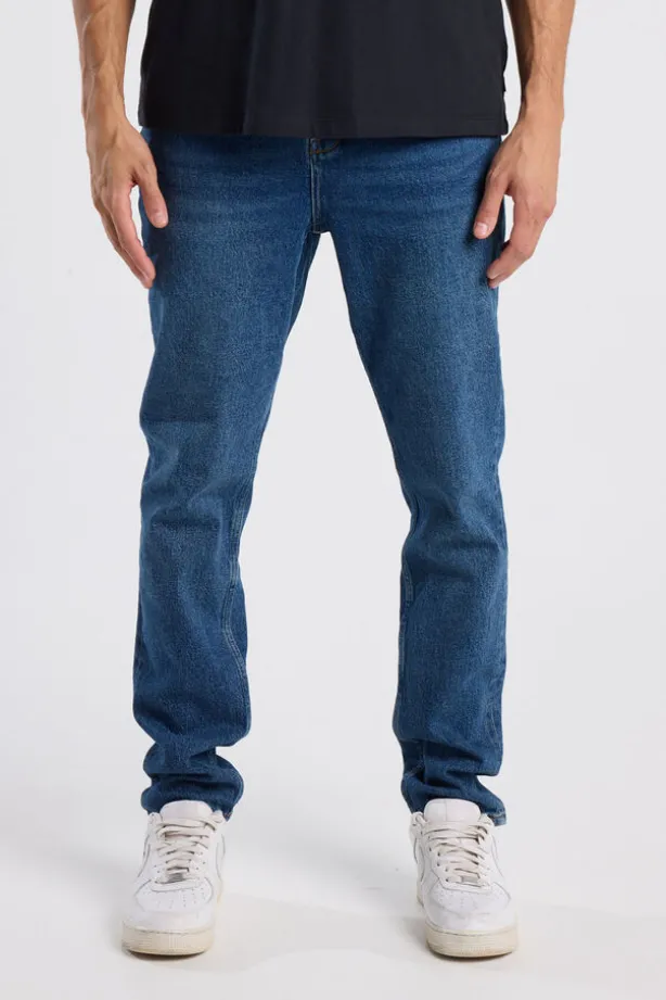 Jeans Neil slim fit jeans met button fly en zwarte wassing