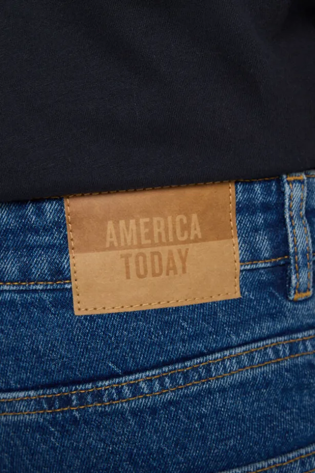 Jeans Neil slim fit jeans met button fly en zwarte wassing