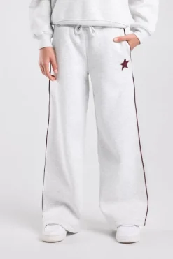 Joggingbroek Cassia Jr wide leg joggingbroek met bordeaux piping