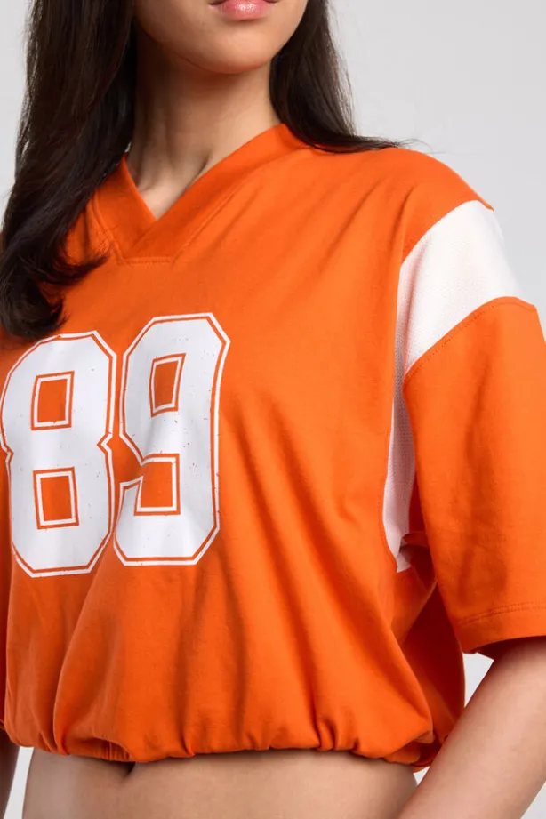 T-shirt Enny sporty t-shirt met v-hals en elastische zoom