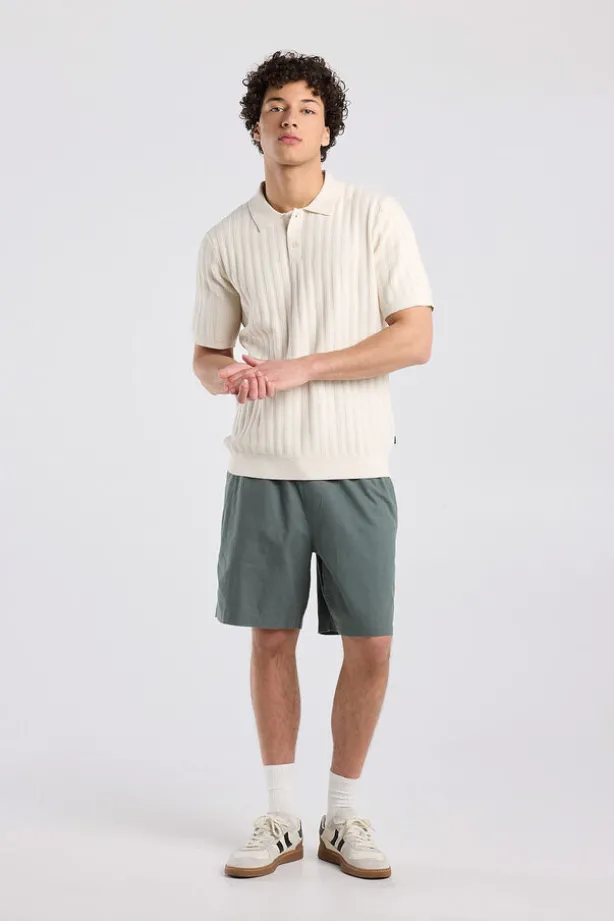 T-shirt Kaj knit polo t-shirt met knoopsluiting en geborduurde strepen