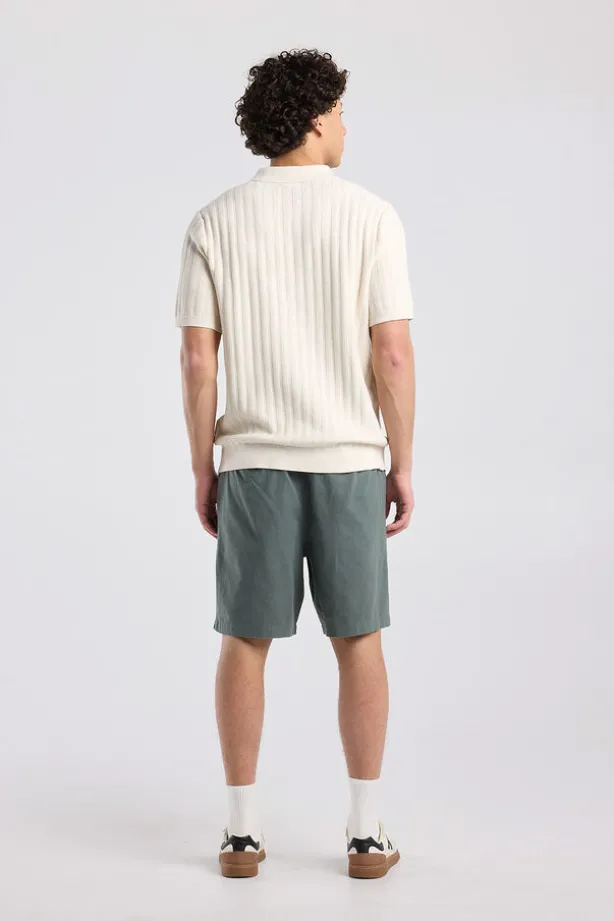 T-shirt Kaj knit polo t-shirt met knoopsluiting en geborduurde strepen