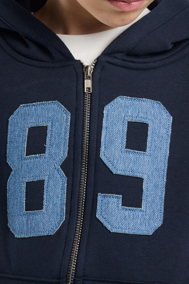 Zip-up sweater Sanne Jr zip-up sweater met capuchon en kangaroo zak